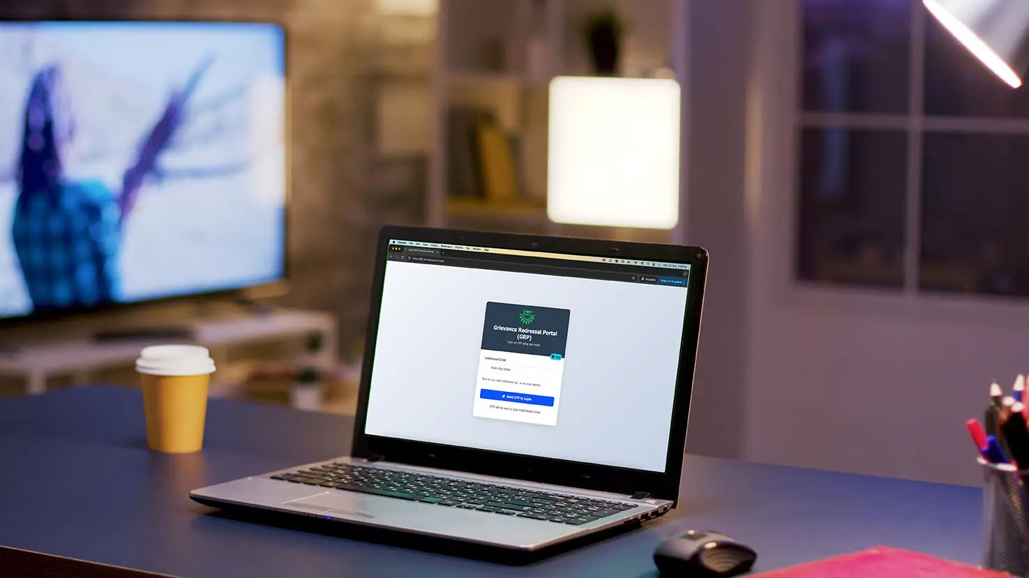 Desktop computer with green screen on home office.